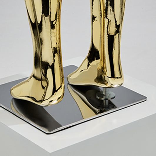 Gold fiberglass child mannequin with stable retail display base