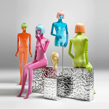 Colorful mannequins with various wig