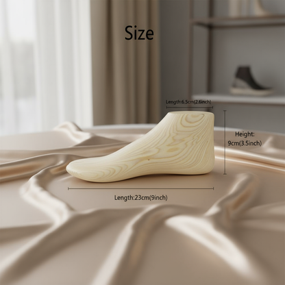 Wooden foot mannequin on silk fabric