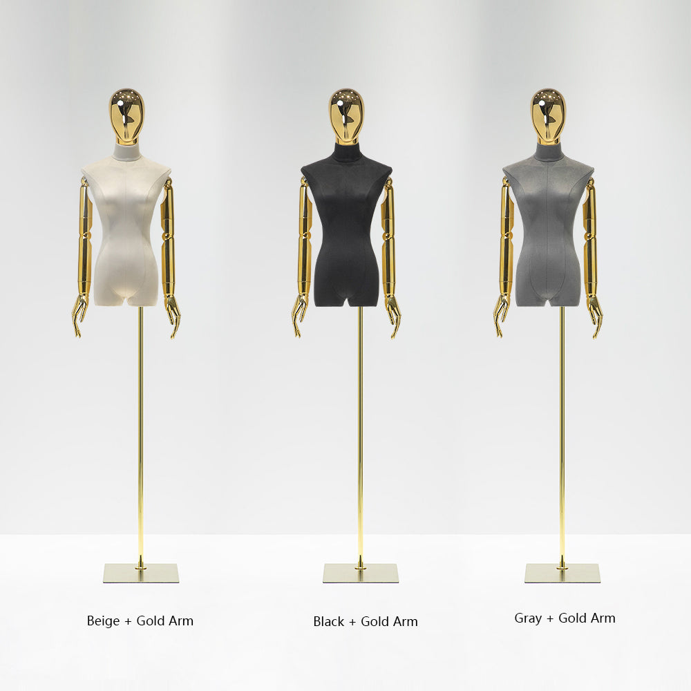 Beige, black and gray velvet female mannequin torsos with mirrored heads, silver articulated arms and adjustable stands